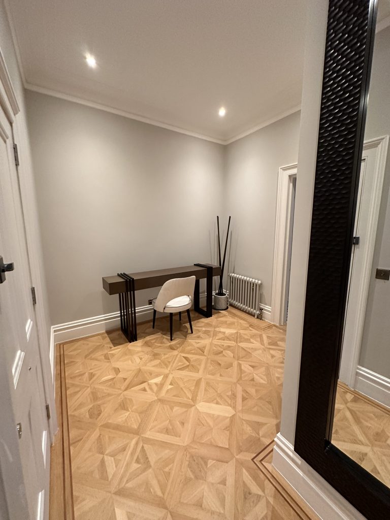 Hallway renovation South London by LMDEC LTD Luxury herringbone parquet flooring and console table in Wimbledon hallway refurbishment