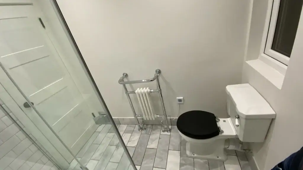 Classy Bathroom with glass screen in Wimbledon townhouse