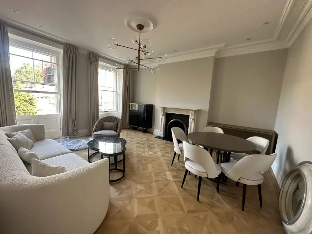 Luxury living room refurbishment in Kensington apartment by LMDEC LTD with bespoke joinery and modern finishes
