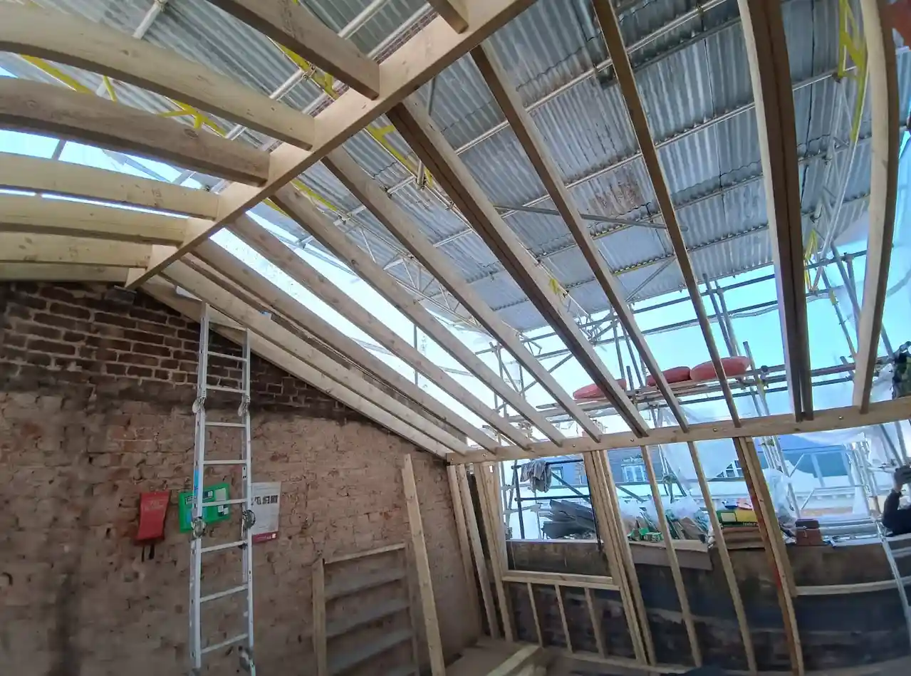 Loft conversion roof structure with timber framing in Pimlico
